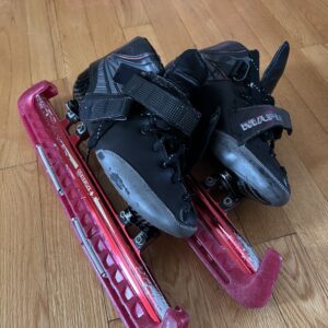 (usagé) $30 Patins  (grandeur 33-34)